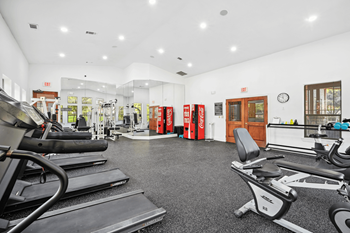 24/7 Fitness center with cardio and strength training equipment